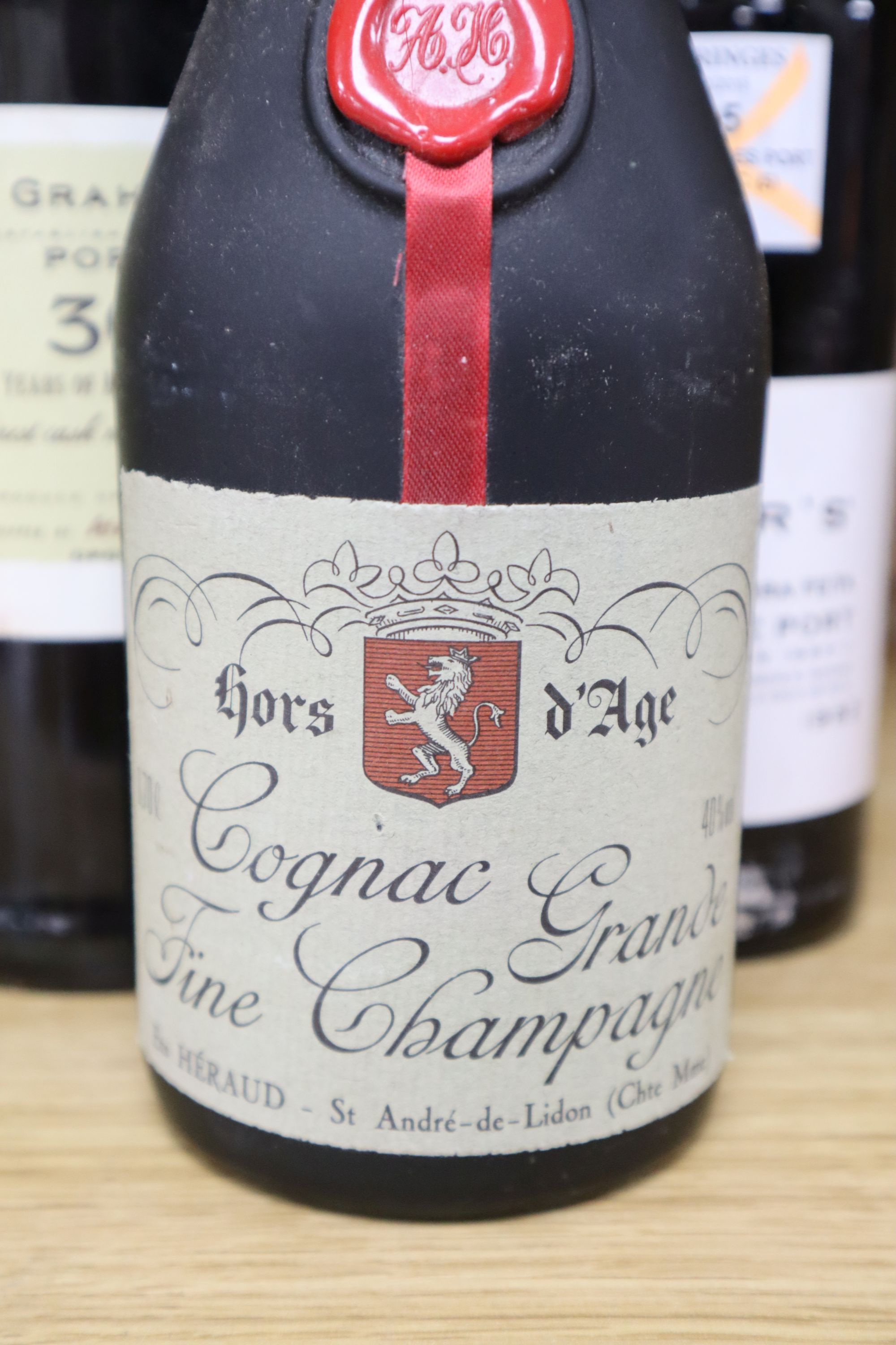 Four bottles of Port and Cognac